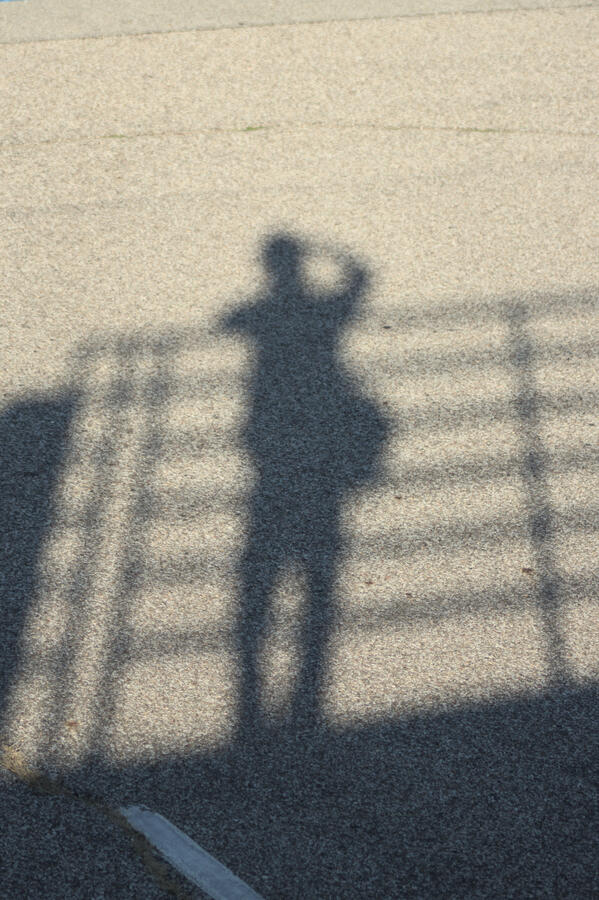 Self Portrait. I was observing the city from the overview at the clock tower I occasionally visit. At some point I concentrated on my shadow, and I don't often get the motivation to get shots of myself.