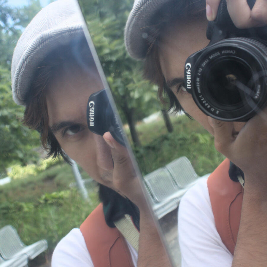 Bouncing off the idea to get more photos of myself if the chance ever arises. Reflected off the River Shards art piece in Mishawaka.